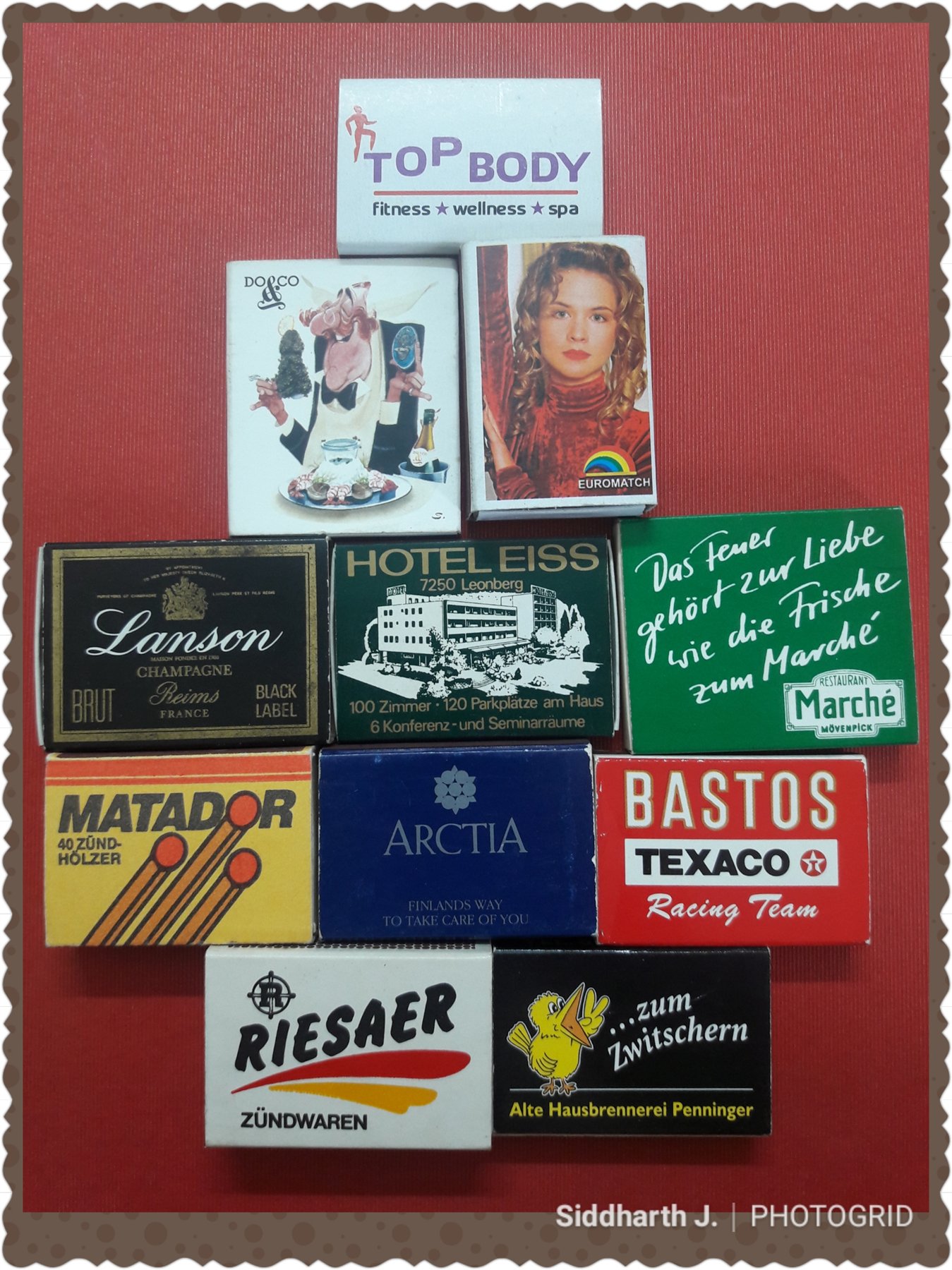 International promotional and hospitality matchboxes arranged on a red background